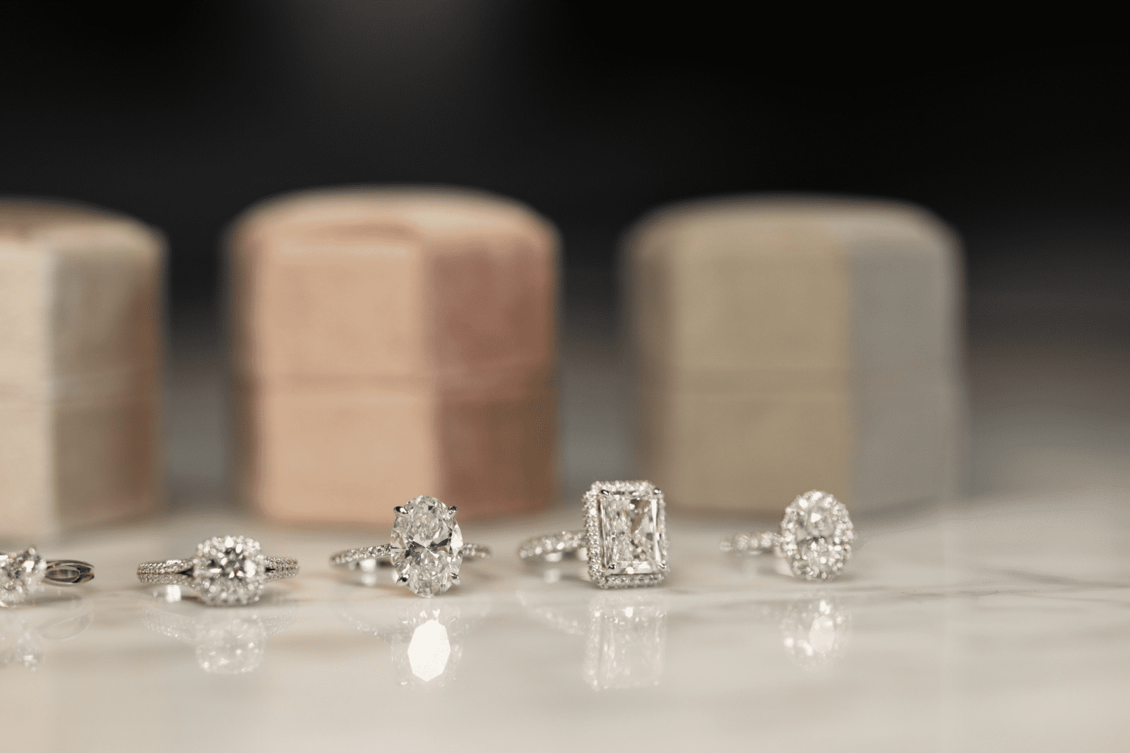 Diamond expert at PLUTUS DIAMONDS helping to choose an engagement ring